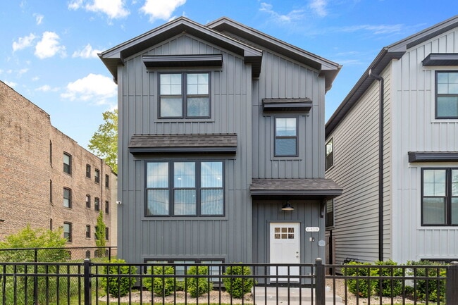 Building Photo - 6418 S Champlain Ave Unit 1