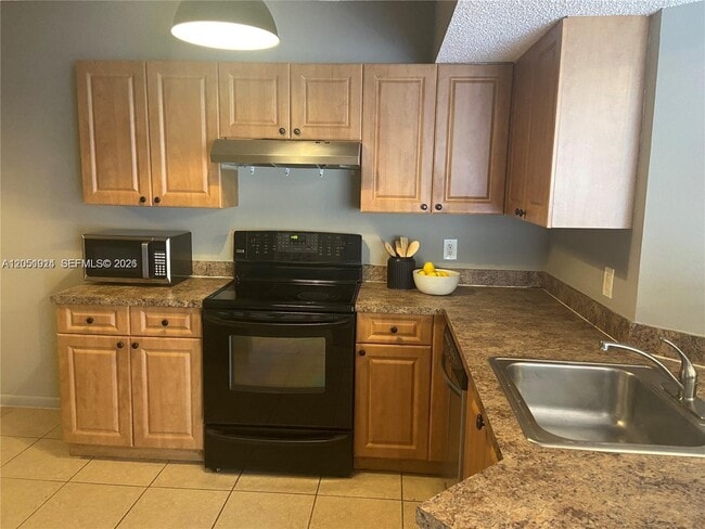Photo - 8871 Wiles Rd Unit 301