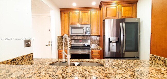 Photo - 7035 NW 186th St Apartment Unit D407