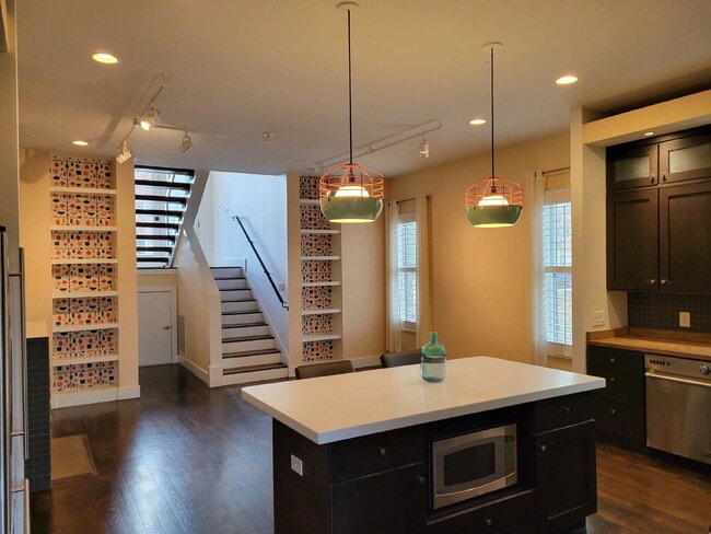 Photo - Luxury 12 South Brownstone with Courtyard | Rooftop Deck with Fireplace & Scenic Views | 2-Car Ga...