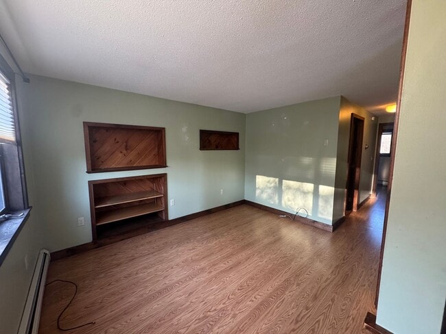 Photo - Cozy 2-Bedroom Second-Floor Home with Backyard & Deck