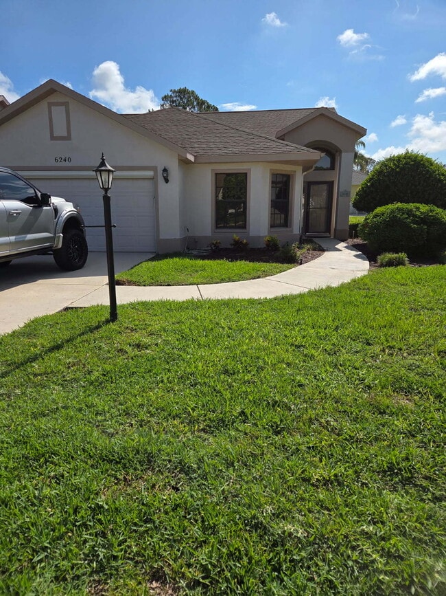 Building Photo - "Discover Comfort and Style in This Spacious 2-Bed, 2-Bath home at 6240 Fairskies Dr, New Port Ri...