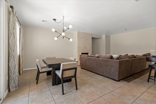Photo - Spacious, Stylish & Partially Furnished 3-Bedroom Home with Attached Garage