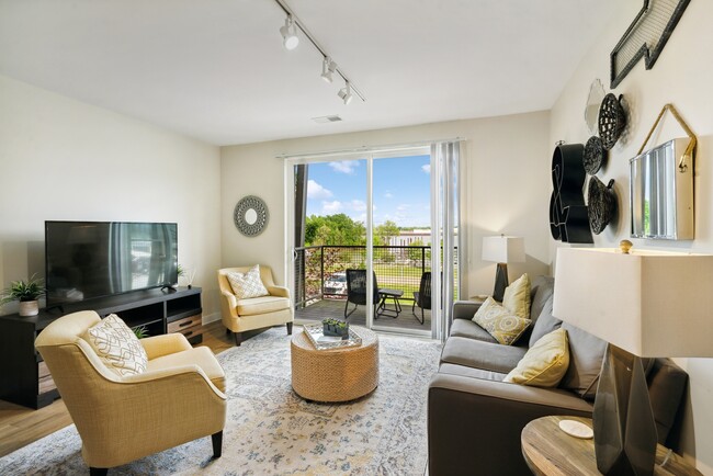 Spacious Living Area - Waterside at River Park Apartments