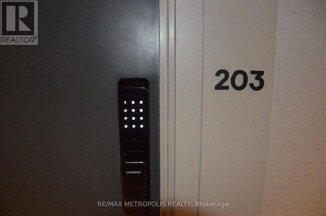 Photo - 335 Wheat Boom Dr. Unité 203