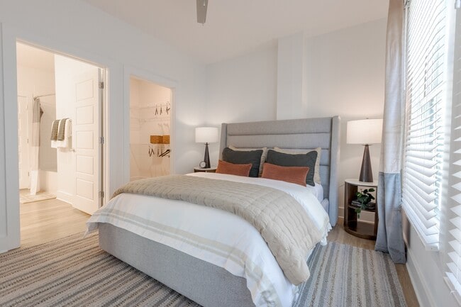 Primary Bedroom at The Merchant Apartments in Charleston, SC 29403