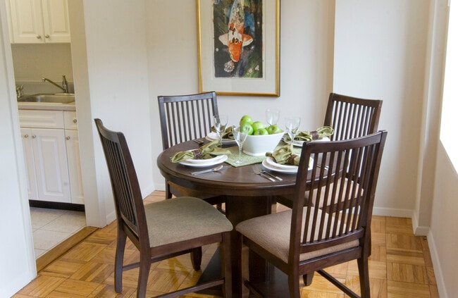 Dining area with parquet flooring
