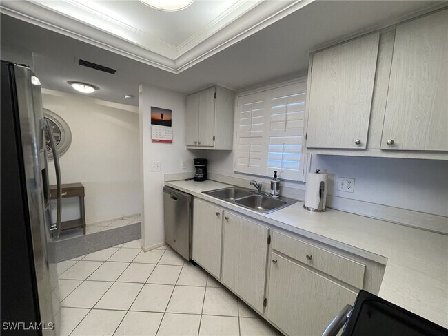 Building Photo - 5435 Rattlesnake Hammock Rd Unit 202