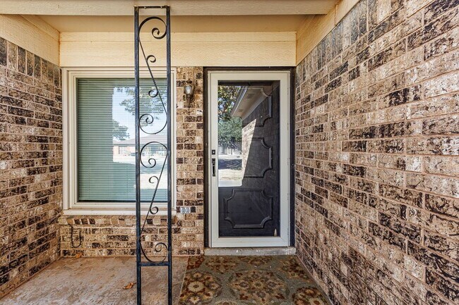 Photo - Charming 4-Bedroom Home with Cozy Fireplac...