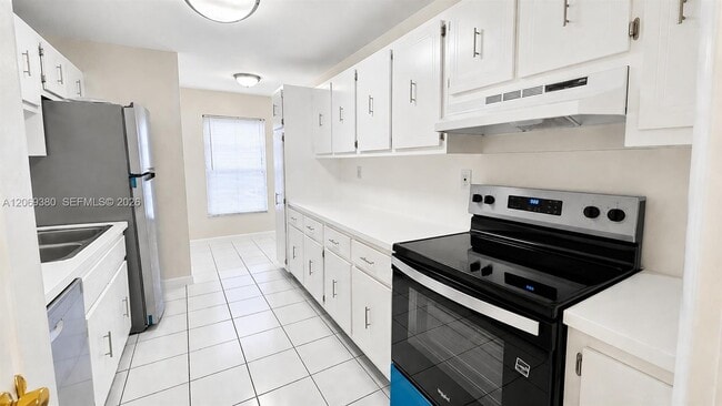 Building Photo - 7345 W 4th Ave Unit 402