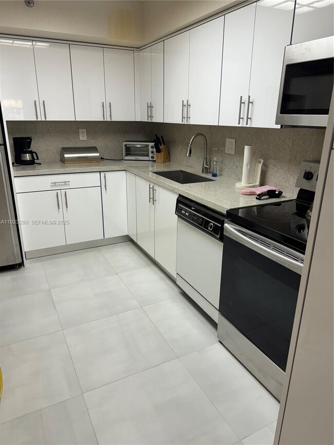 Photo - 3600 Mystic Pointe Dr Unit 208