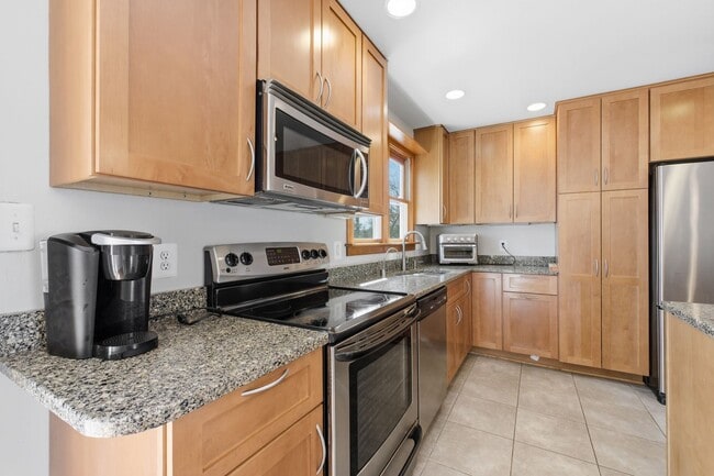 Photo - 5BR / 3BA Home with Flexible Living Space & Tree-Lined Views
