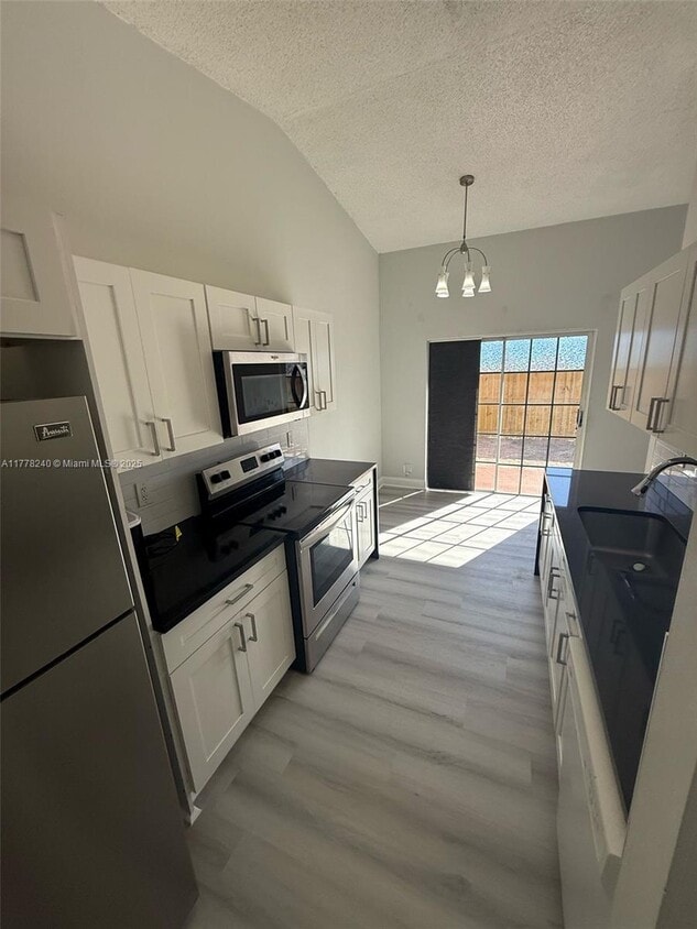 Photo - 990 NE 212th Ter (Miami, FL)