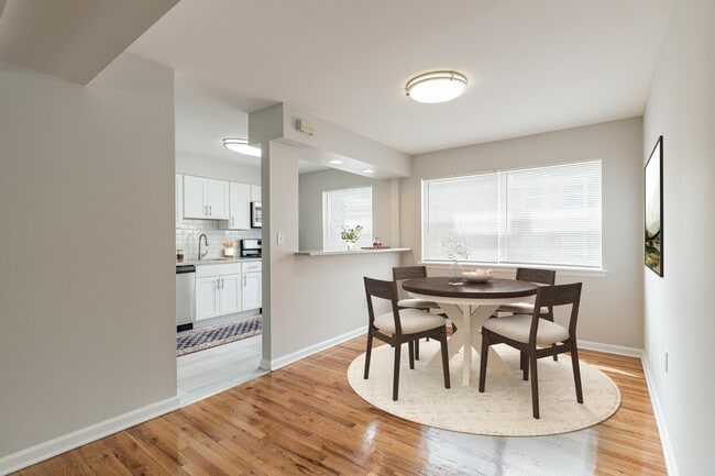 Step into your stylish new home at Eagle Rock Apartments at North Plainfield. This inviting dining area, featuring modern finishes and ample natural light, is perfect for gatherings. Explore your future residence today!