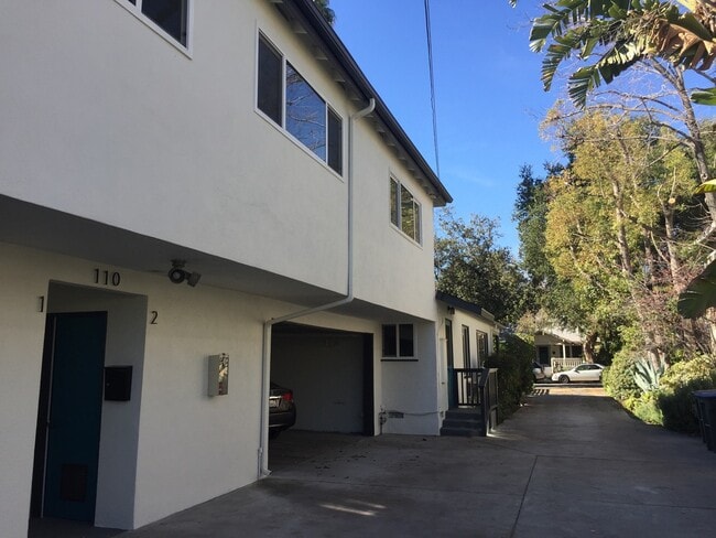 top apartment- there are 3 of those 8 foot wide windows - 110 S Grand Oaks Ave Unit 2