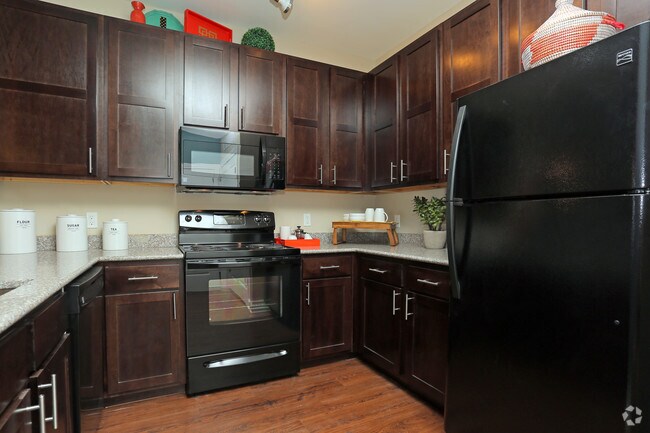 1BR - 783SF - Kitchen - The Promenade Apartments at Pinnacle Hills