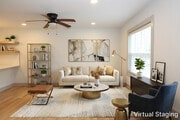 Well-lit living area with recessed lighting