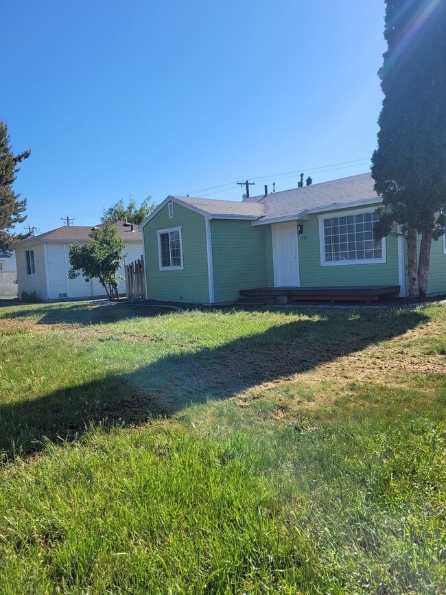 Building Photo - Free May rent with 1 Year Lease - Fully Remodeled with Garage & Yard Care Included