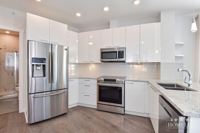 Photo - Corner Gem with Private Greenbelt Views – ... Unit 407