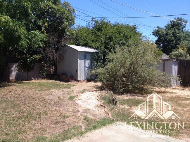 Photo - Charming 4-Bedroom Home in Arden-Arcade with Spacious Yard & Convenient Location