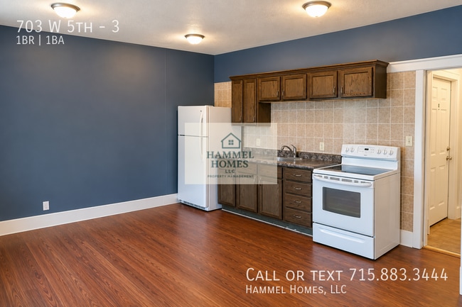 Building Photo - 703 W 5th St Unit 3
