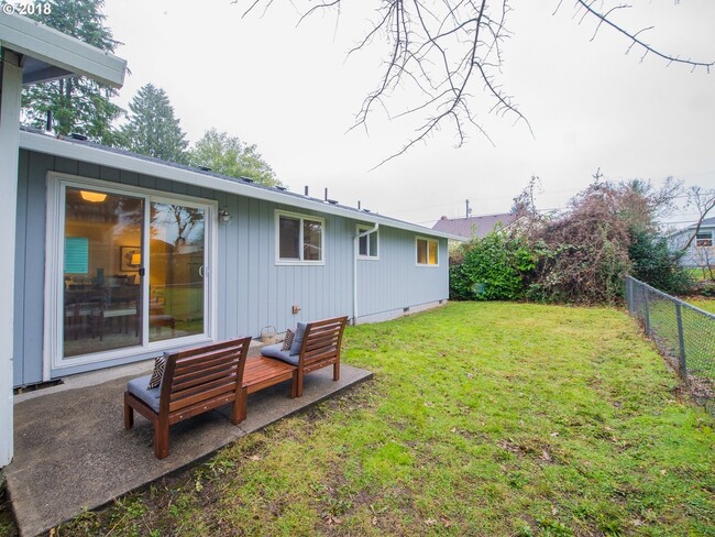 Backyard is mostly on the west side of the house - great for gardening and enjoying the sunsets. - 1612 NE Liberty St