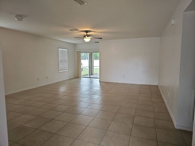 Photo - Nice 3 bed 2 bath 2 car garage single family home in Cape Coral with lawn care included.