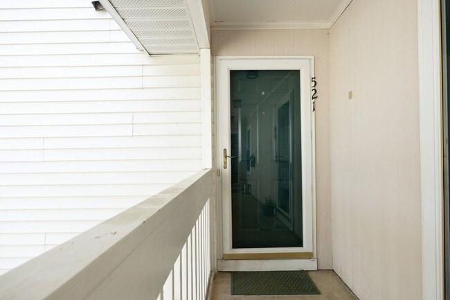 Photo - Now Available in Cary! Cozy 2-Bedroom Condo with Fireplace, Pool Access & Covered Porch!