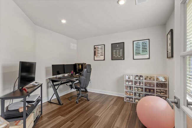 Photo - Luxurious three-story townhome with owner's suite and high-end finishes