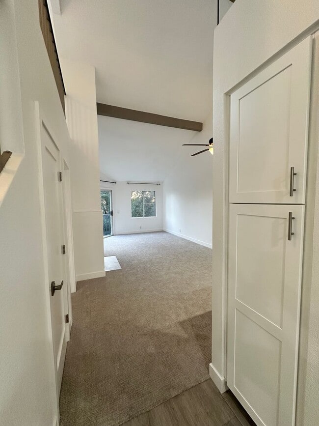 Photo - Charming Loft Condo with Balconies, Vaulted Ceilings & Fireplace – For Lease