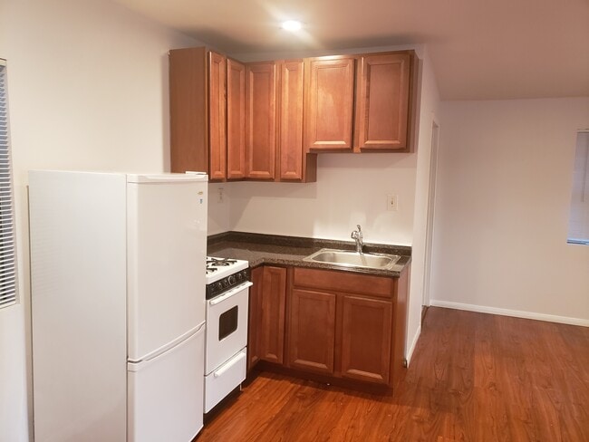 Kitchen nook with cabinet storage.