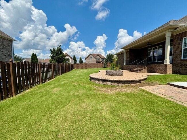 Photo - Madison City Schools with a 3 car garage and large fenced yard!