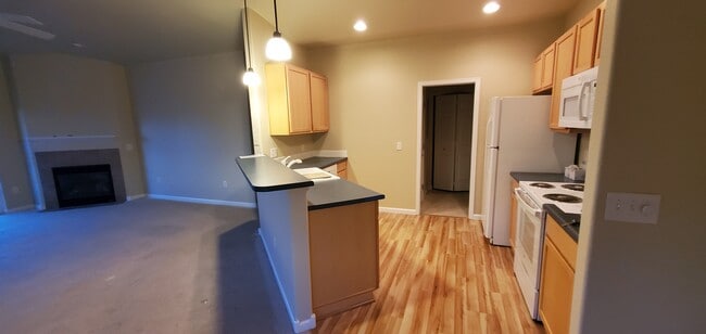 Open floor plan. Kitchen breakfast bar, LR. - 2214 Owens Ave Unit 2214 Owens Ave #202
