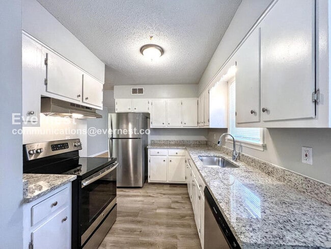 Photo - 3-Bedroom Home with Fenced Yard & Carport / Pet-Friendly / Coming Soon!