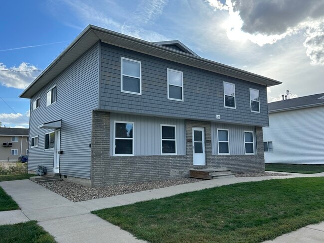 Building Photo - 1100 W 20th St Unit 1100