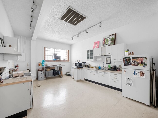 Photo - The Roscoe Apartments Unidad 907 – Suite C