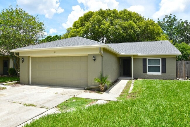 Building Photo - Water view 3/2 in Alafaya Woods. UPDATED k... Rental