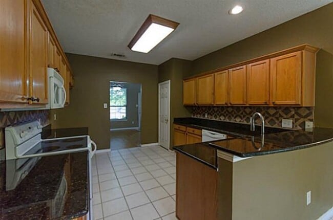 Photo - Elegant home with wooden floors, Ceramic tiles. Solar Panels will reduce your monthly electricity...