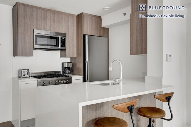 Photo - 311 W 50th St Unidad FL2-ID692