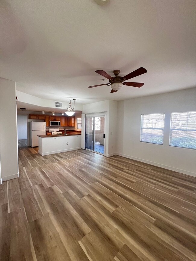 Photo - Gated Community / Community Pool / Luxury Vinyl Planking Throughout