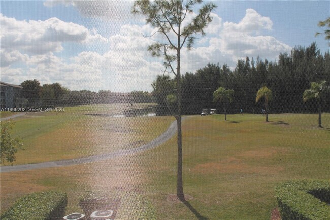 Building Photo - 12500 SW 6th St Unit 202N