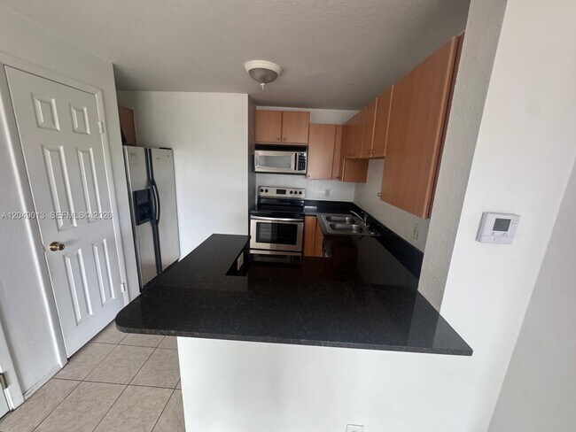 1780 Palm Cove Blvd Unit 6-306