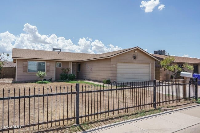 Building Photo - 9509 W Pierce St Rental