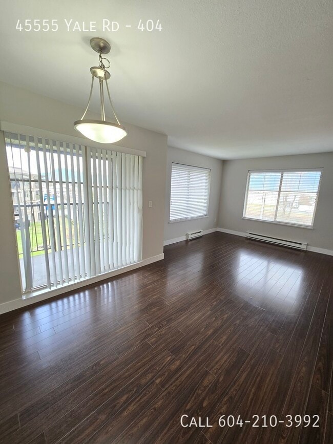 Building Photo - Corner Unit 404