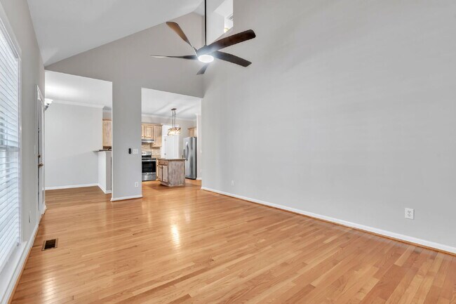 Photo - Beautifully Appointed 4BR Home Featuring a Screened Porch, Spacious Living Areas & Community Pool...