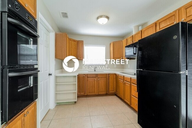 Photo - 4 Bedroom Pet-Friendly Home in St. Cloud, FL with Main Street Renewal