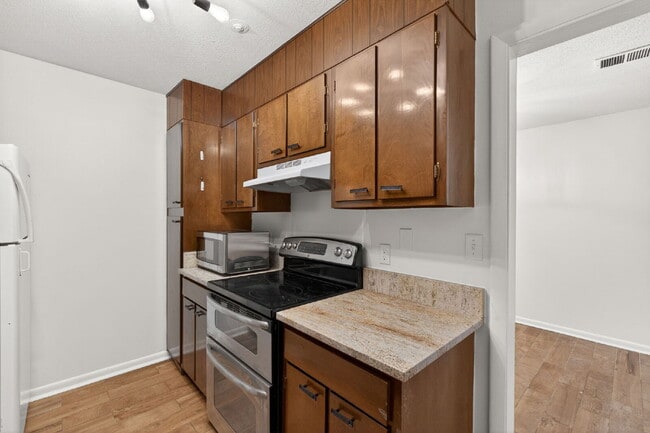 Photo - Move-In Ready 2BR Condo | Pool Access & Water Included