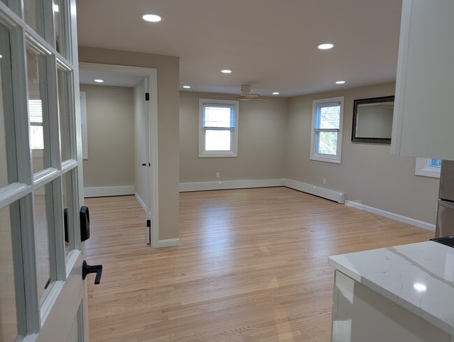 Living area, door to bedroom on left - 63 Buttles Rd Unit Buttles Rd In-law