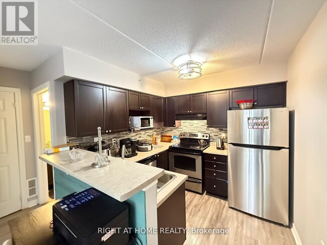 Photo - 1340 Main St E Unit 206