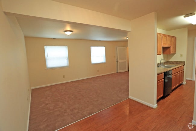 Living area leading in to the dining and kitchen area